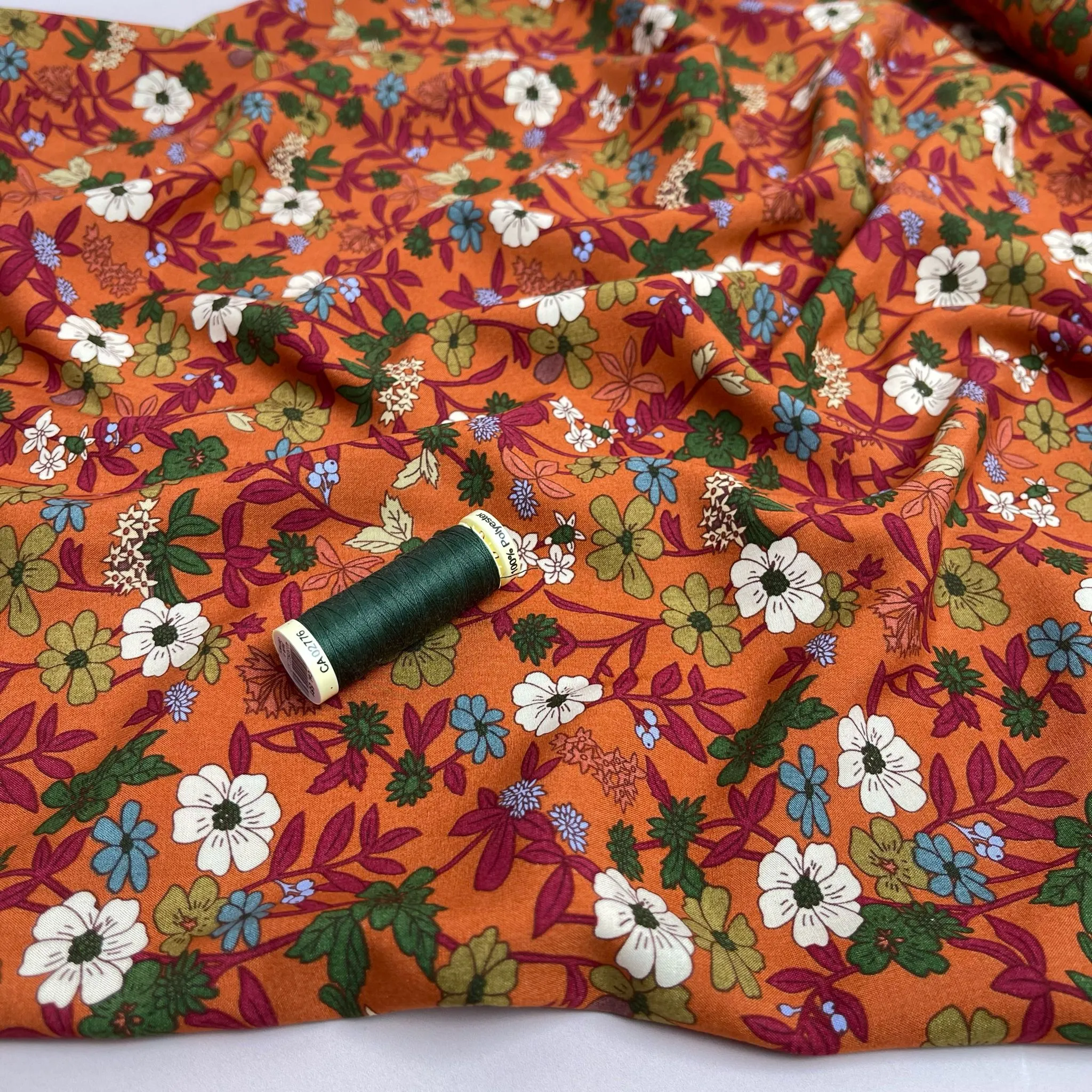 Autumn Blossoms on Orange Viscose Fabric